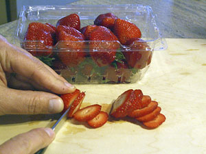 slicing strawberries