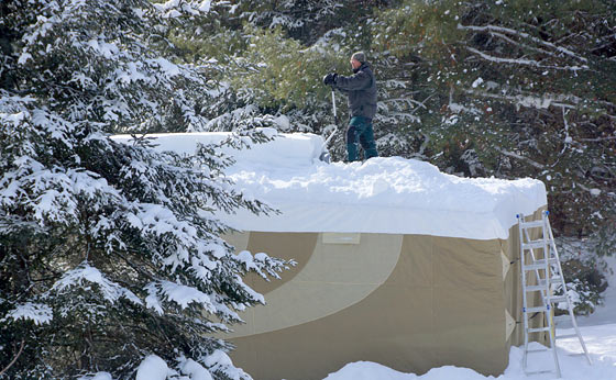 shoveling-snow-off-the-roof