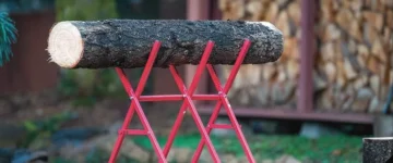 use this folding log stand with the best hand saw for cutting logs