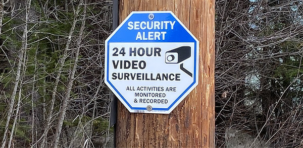 video surveillance signs for home defense tactics and prevention