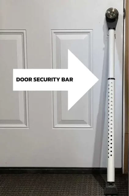 My Masterlock door security bar against the door.