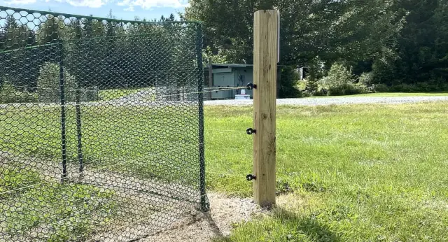Electric fence corner post and insulators
