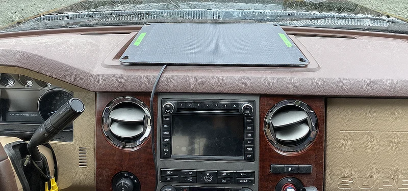 20 watt solar charger in window of vehicle